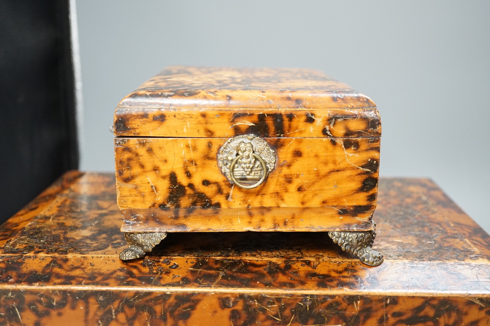 Two William IV simulated tortoiseshell pokerwork sewing boxes - largest 35.5cm wide, 15.5cm tall, 26cm deep